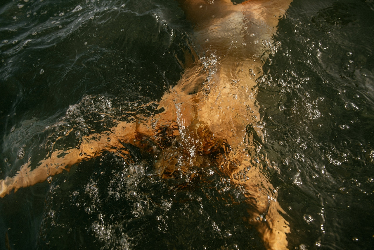 beth swimming in muskoka in the summertime